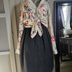 Divided Black A-Line Skirt with Floral Blouse